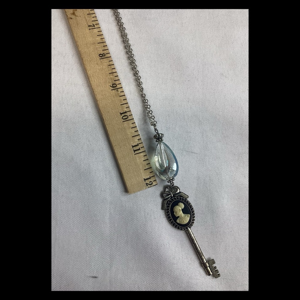 Cameo black and silver key necklace.